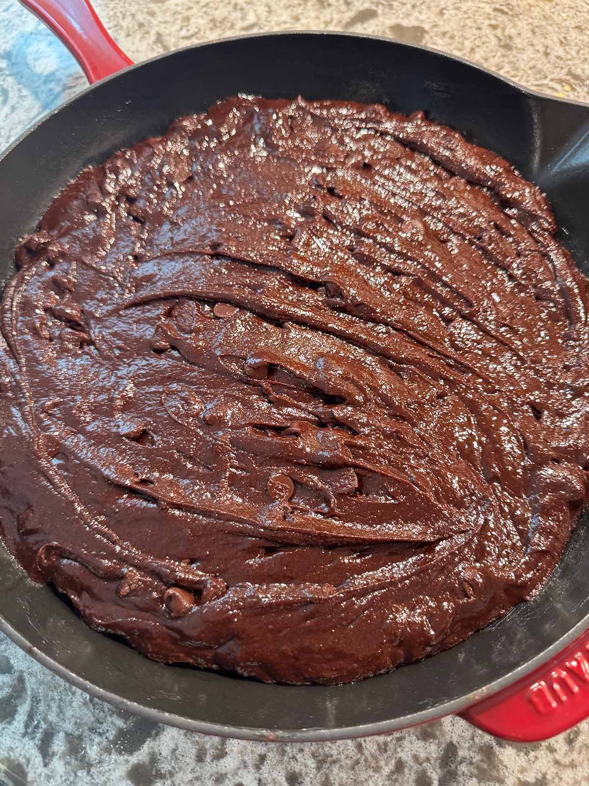 brownie batter in a 10-inch cast iron skillet. 