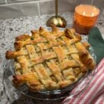 chicken pot pie with puff pastry in a 9 inch baking dish
