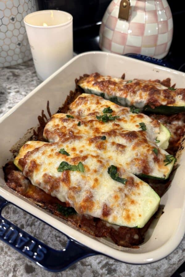 Lasagna stuffed zucchini boats with meat sauce and melted mozzarella.
