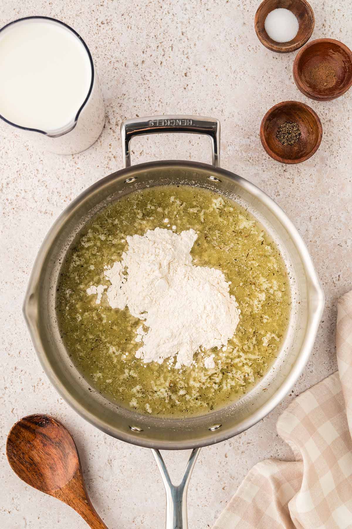 Melted butter, garlic, and flour in a skillet.