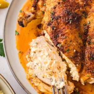 Ruth Chris stuffed chicken up close with a fork.