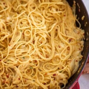 onion spaghetti in a cast iron skillet.