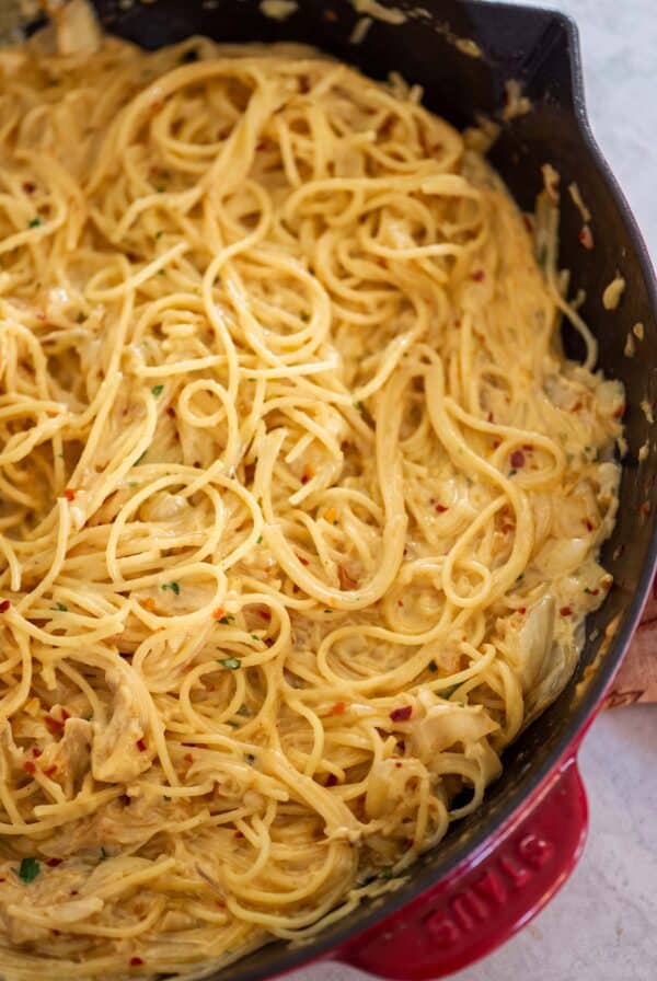 onion spaghetti in a cast iron skillet.