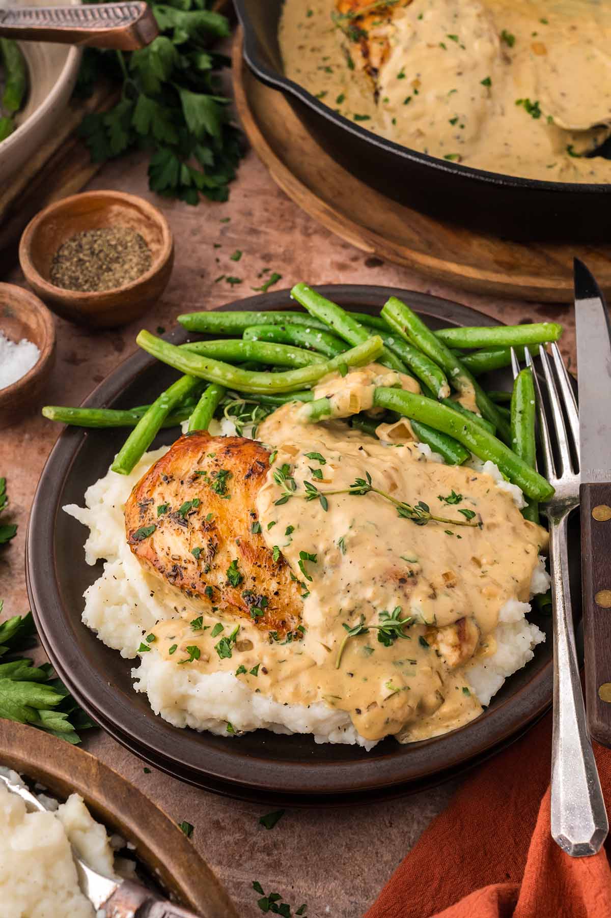 creamy chicken with mashed potatoes and green beans.