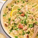 lemon garlic lobster orzo in a white skillet.