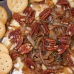 baked Brie with caramelized onions and ritz crackers on the side.