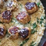 chicken meatballs over orzo.