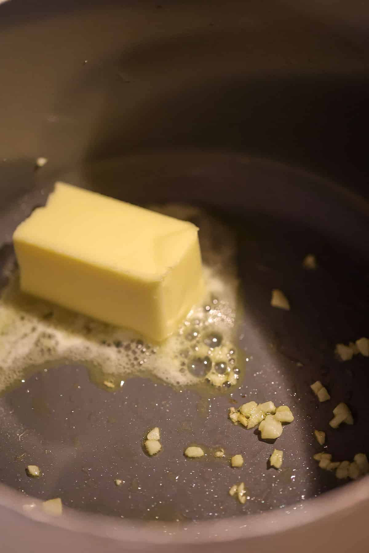 butter and minced garlic in a saucepan.