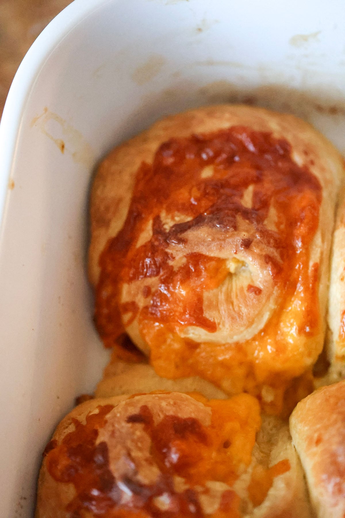 one cheesy garlic roll up close.