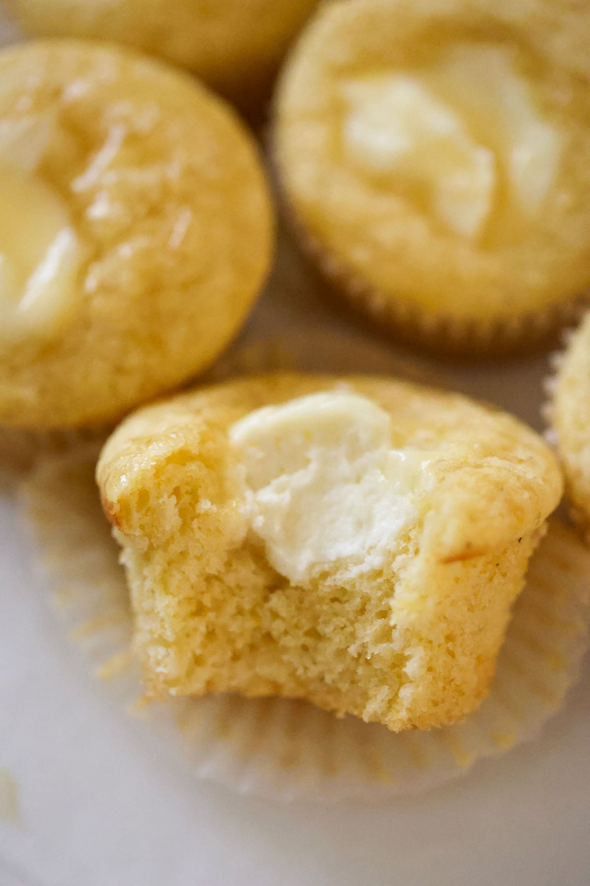 cream cheese cornbread muffin sliced in half.