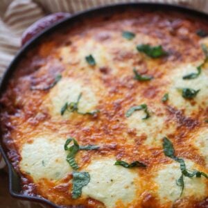 Gnocchi lasagna with fresh basil on top.