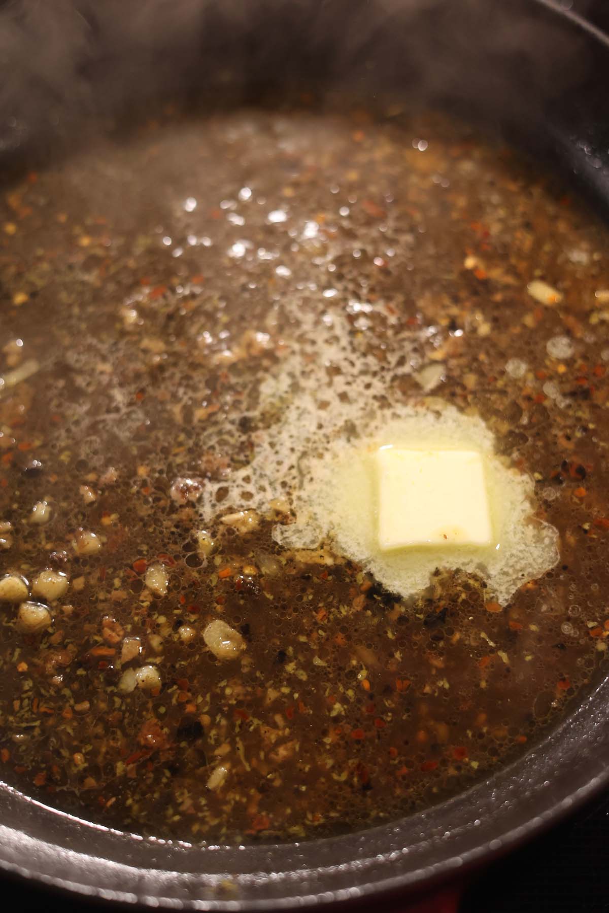 butter and chicken stock in a skillet.